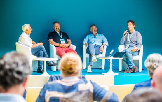 focused speakers talk during logistics conference