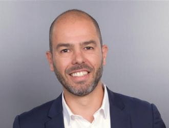Portrait of Sébastien BROUSSE, a smiling, professional member of the sales team.